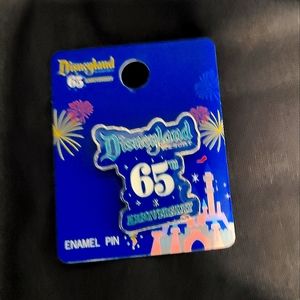 Disney Loungefly 65th anniversary pin.